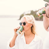 Person drinking an enigma pale ale